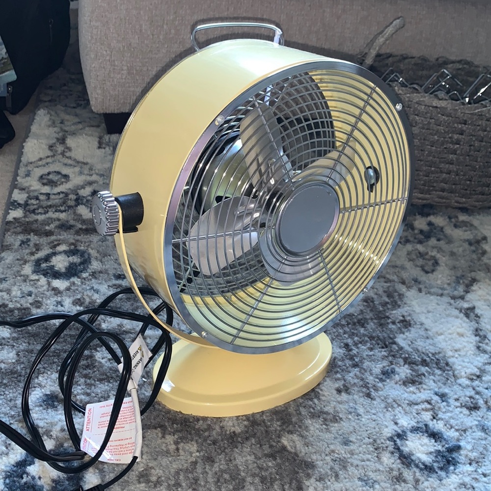 Yellow Tommy bahama window fan